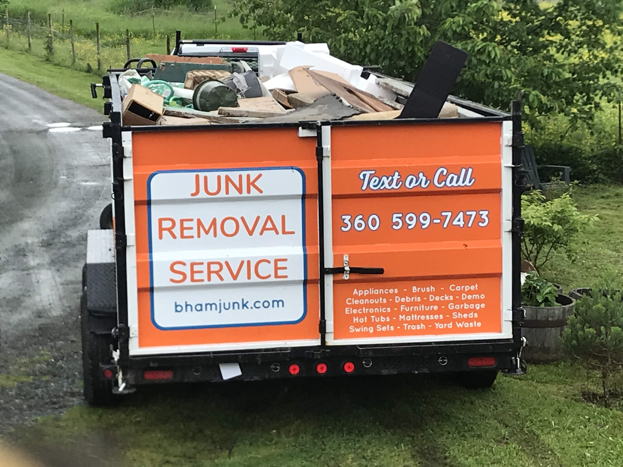 Trailer full of junk being hauled away